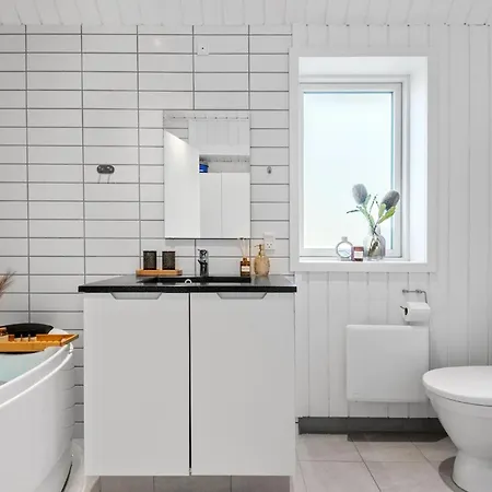 Three-bedroom In Hébergement de vacances *